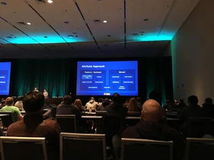 A GDC talk in progress, the slide on screen headed Attribute Approach